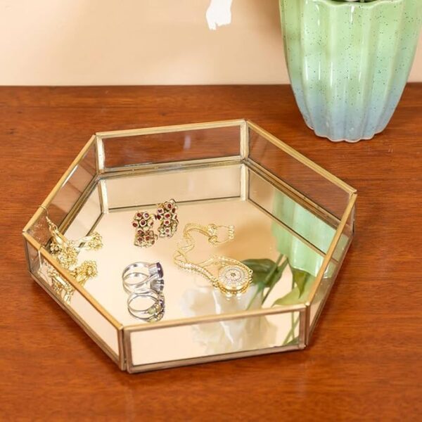 Elegant hexagonal glass tray with brass rim and mirrored base for luxury decor