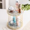 Chic gold metal organizer rack with marble glass tray for decorative display