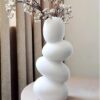 Handcrafted ceramic pebble vase in matte white finish – The White Space Living