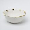 Elegant ceramic bowl with antique finish for serving salads and snacks.