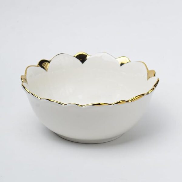 Elegant ceramic bowl with antique finish for serving salads and snacks.