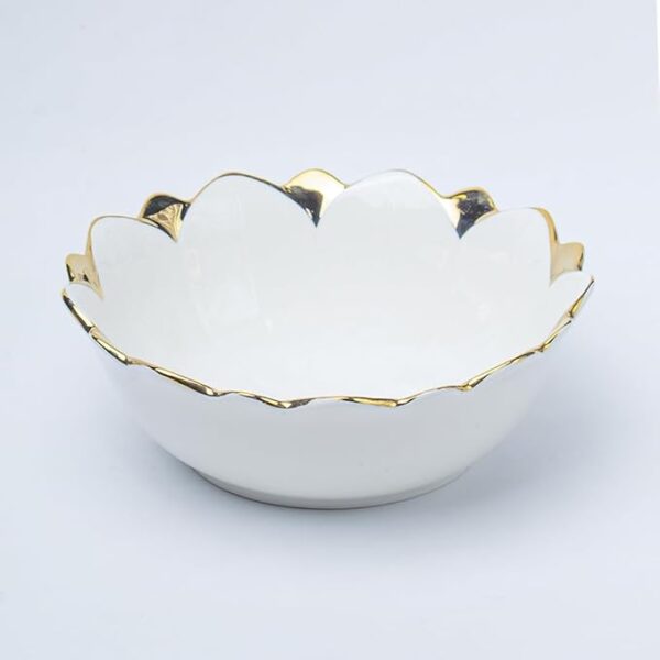Classic off-white ceramic bowl used for snacks and fruits.