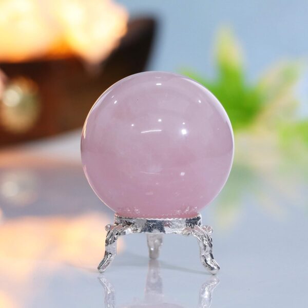 Elegant rose quartz crystal ball for office desk décor