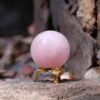 Decorative pink rose quartz sphere ball with metal holder