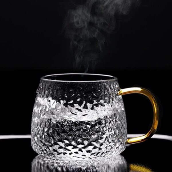 Elegant transparent glass cups for green tea and herbal infusions