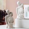 Resin hugging couple figurine décor showpiece for home