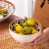 Porcelain dinner plates and bowls in Japanese floral design
