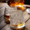 Unique Whiskey Glass with Rotating Base for Stylish Drinking