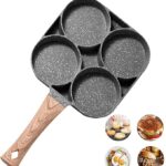 Nonstick 4-cup pancake pan with golden pancakes cooking on a stovetop