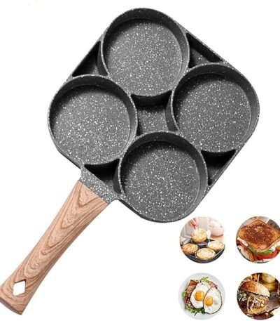 Nonstick 4-cup pancake pan with golden pancakes cooking on a stovetop