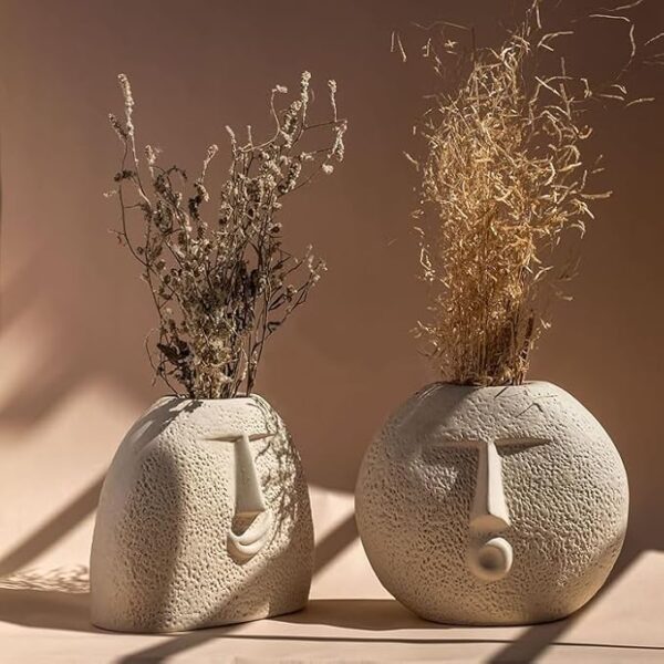 Artistic ceramic vase featuring blowing kiss expression for flowers