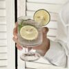 Vintage-inspired ribbed drinking glasses with luxurious design