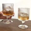 Ribbed goblet-style wine glasses for elegant