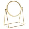 Golden round mirror stand with elegant vintage design