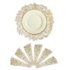 Golden leaf-shaped placemat enhancing elegant dining setup