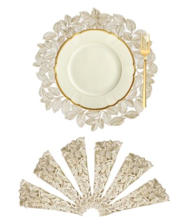 Golden leaf-shaped placemat enhancing elegant dining setup