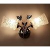 Modern wall lamp with frosted decorative glass shade and sleek fixture