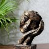 Unique handmade resin statue with human face expression and hand resting on chin