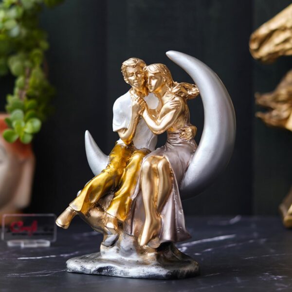 Elegant couple statue sitting on moon for living room