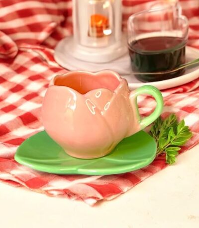 Ceramic mug with unique lotus design, saucer, and dessert plate set.