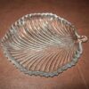 Elegant crystal glass plate shaped like a leaf