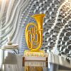 Golden saxophone musical instrument showpiece for elegant home décor.