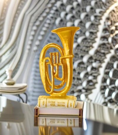 Golden saxophone musical instrument showpiece for elegant home décor.