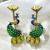 Hand-painted peacock candle holder with intricate metal