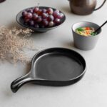 Stylish ceramic serving platter with handle for dinner parties