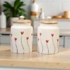 Stylish ceramic condiment jar with wooden sealing cover