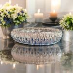 Decorative silver basket tray used as pooja plate for temple rituals