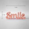 Elegant peach smile figure sculpture for minimalist home design