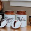 Ceramic tea and sugar storage jars with cultural touch