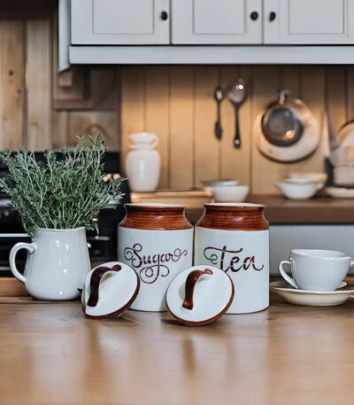 Dual tone ceramic jar set with lids for tea and sugar storage