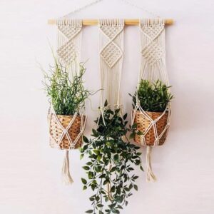 Boho macrame wall hanging with wooden shelf for indoor plants