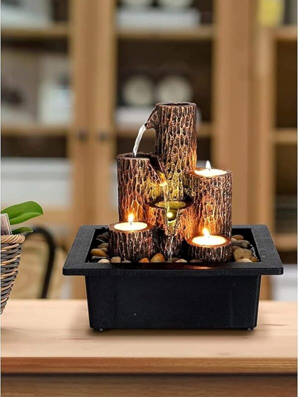 Candle holder with decorative resin tabletop water fountain