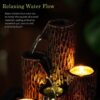 Candle holder with decorative resin tabletop water fountain