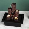 Indoor water fountain with soothing waterfall and candle holder