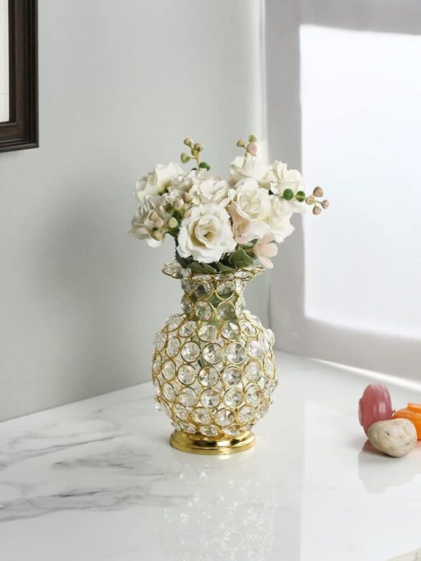Golden metal flower vase with sparkling crystal