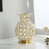 Luxury golden vase with crystal embellishments