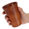 Hand-carved wooden water tumbler with natural polish