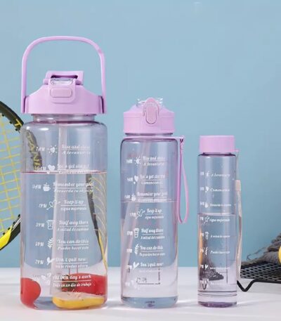 Transparent 2L water bottle set with motivational quotes, straw, and handle