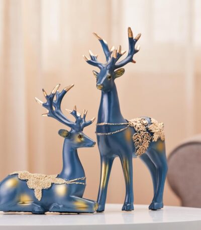 Creative golden reindeer sculpture made of resin for home decor