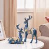 Resin golden reindeer decorative piece for living room shelf