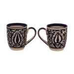 Modern round ceramic mug filled with hot coffee