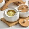 Decorative ceramic spice jar with spoon for tabletop storage