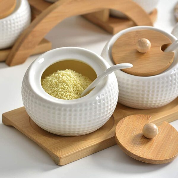 Decorative ceramic spice jar with spoon for tabletop storage