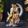 Romantic couple statue sitting on moon decorative showpiece for home décor