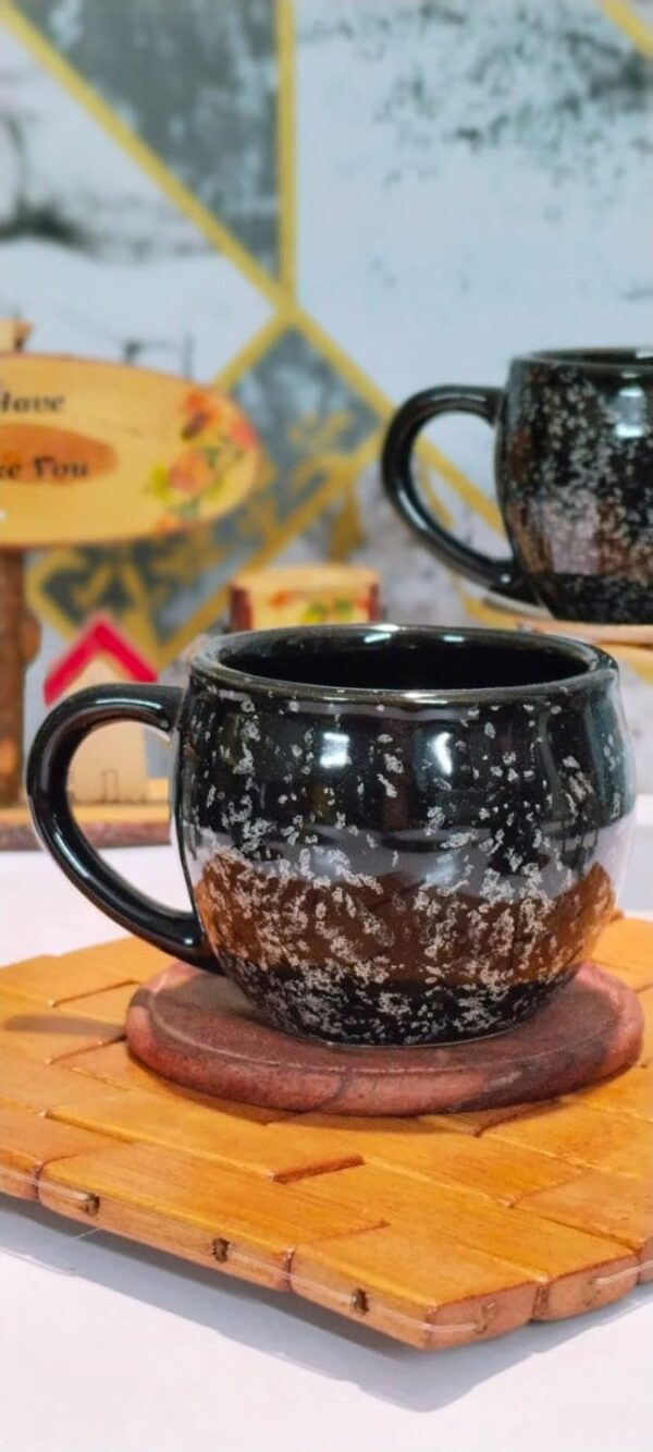 Elegant textured ceramic tea cups in black finish