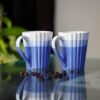 Blue grooved handmade ceramic coffee mug for tea and milk